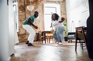 Couple dancing in the living room